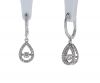 14K White Gold "Rhythm of Love" Diamond Earrings